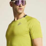 PRO Hypervent Tee 2 - Men by Craft in lime green, lightweight running tee with ventilation and cooling for hot weather performance