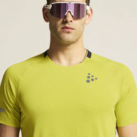 PRO Hypervent Tee 2 - Men by Craft in lime green, lightweight running tee with ventilation and cooling for hot weather performance