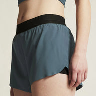 Pro Hypervent Split Shorts 2 - Women by Craft in blue with black waistband, lightweight ventilating running shorts for hot weather workouts