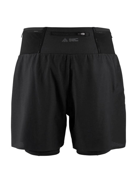 Pro Trail Shorts - Men (6") by Craft in black, lightweight ripstop fabric with inner tights, durable and elastic for high-intensity trail running