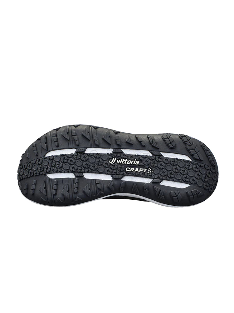 Xplor - Women by Craft in black and white with rugged outsole for versatile trail running and pro-grade outdoor performance