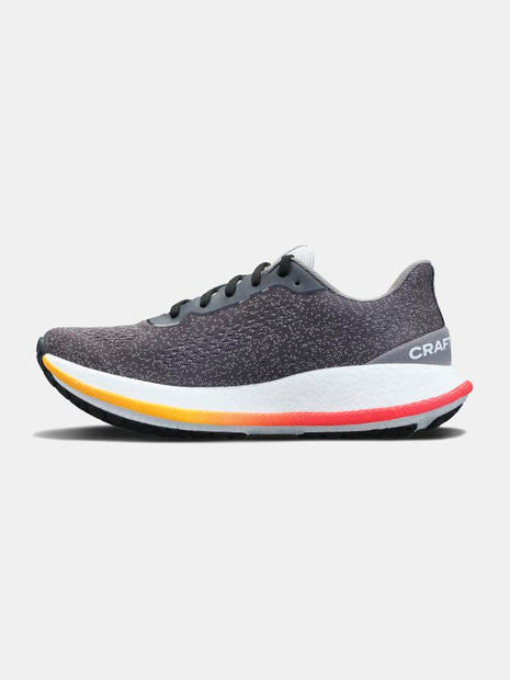 Pacer - Men by Craft in black with orange and red midsole, performance running shoe with Px Foam™ for smooth, stable, responsive ride