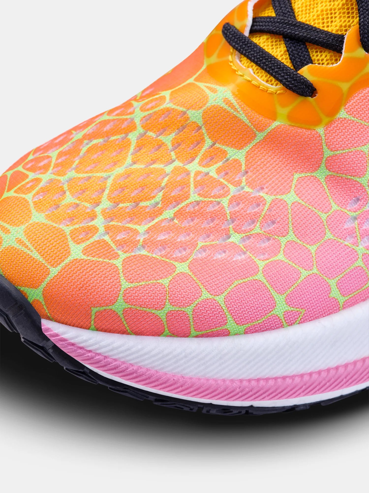 Pacer - Women by Craft in orange and pink with Px Foam midsole for stable, responsive running, designed for road use and performance