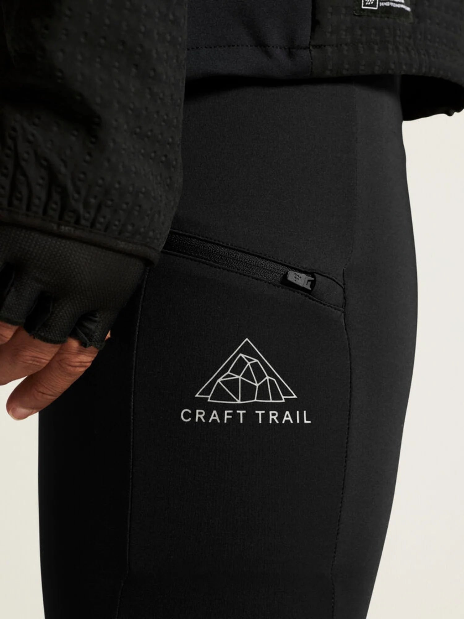 Pro Trail Tights 2 - Men by Craft in black, recycled polyamide running tights with moisture transport, ideal for trail running.