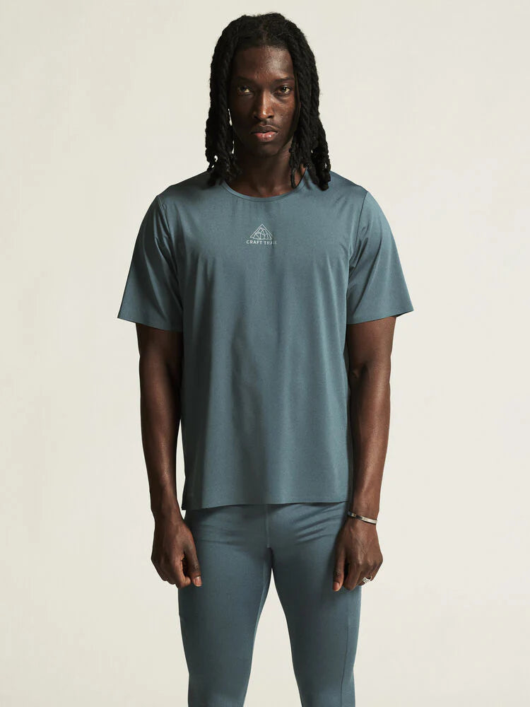 PRO Trail SS Tee 2 - Men in muted blue by Craft, lightweight jacquard running tee designed for high-intensity trail running