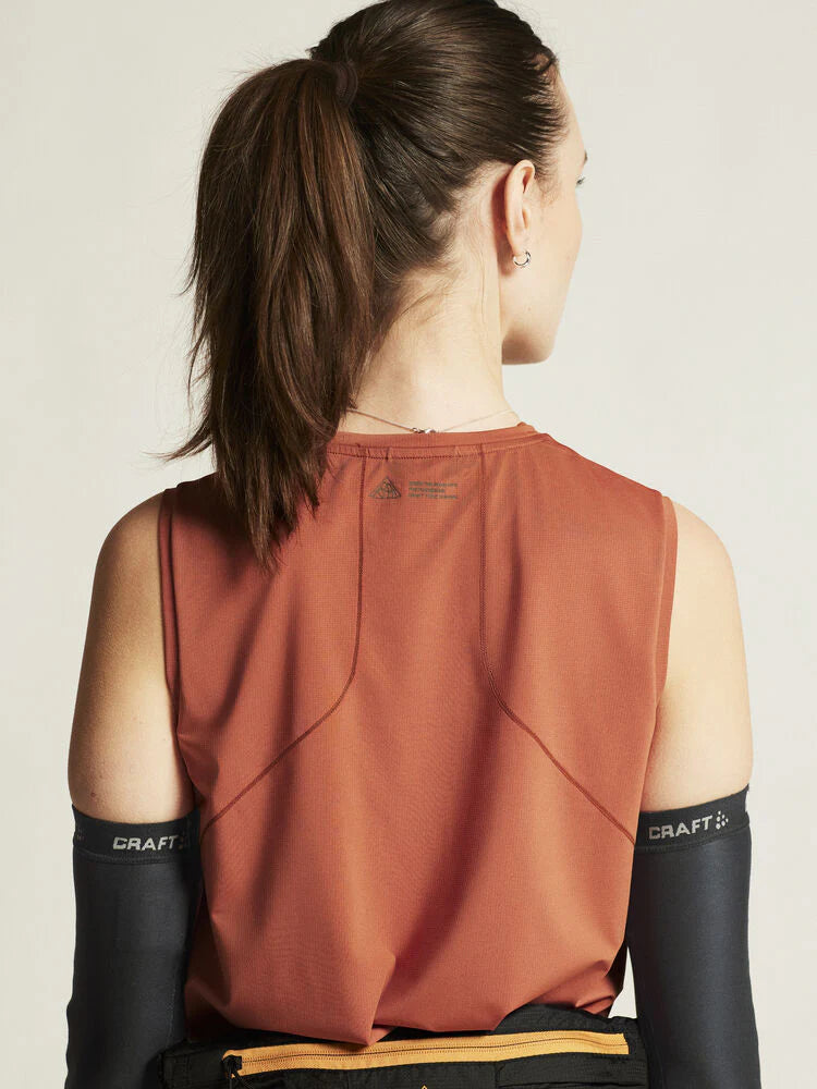 PRO Trail Singlet 2 - Women by Craft in rust red, lightweight jacquard fabric designed for high-intensity trail running performance