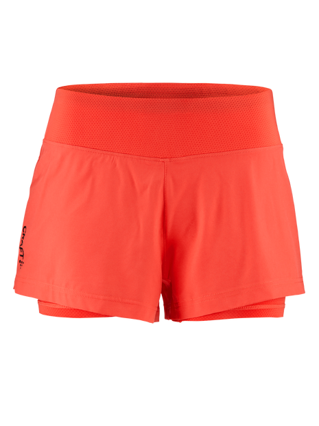 ADV Essence 2-in-1 Shorts - Women (3") by Craft in bright coral, woven stretch fabric with inner tights, ideal for intense training and running.