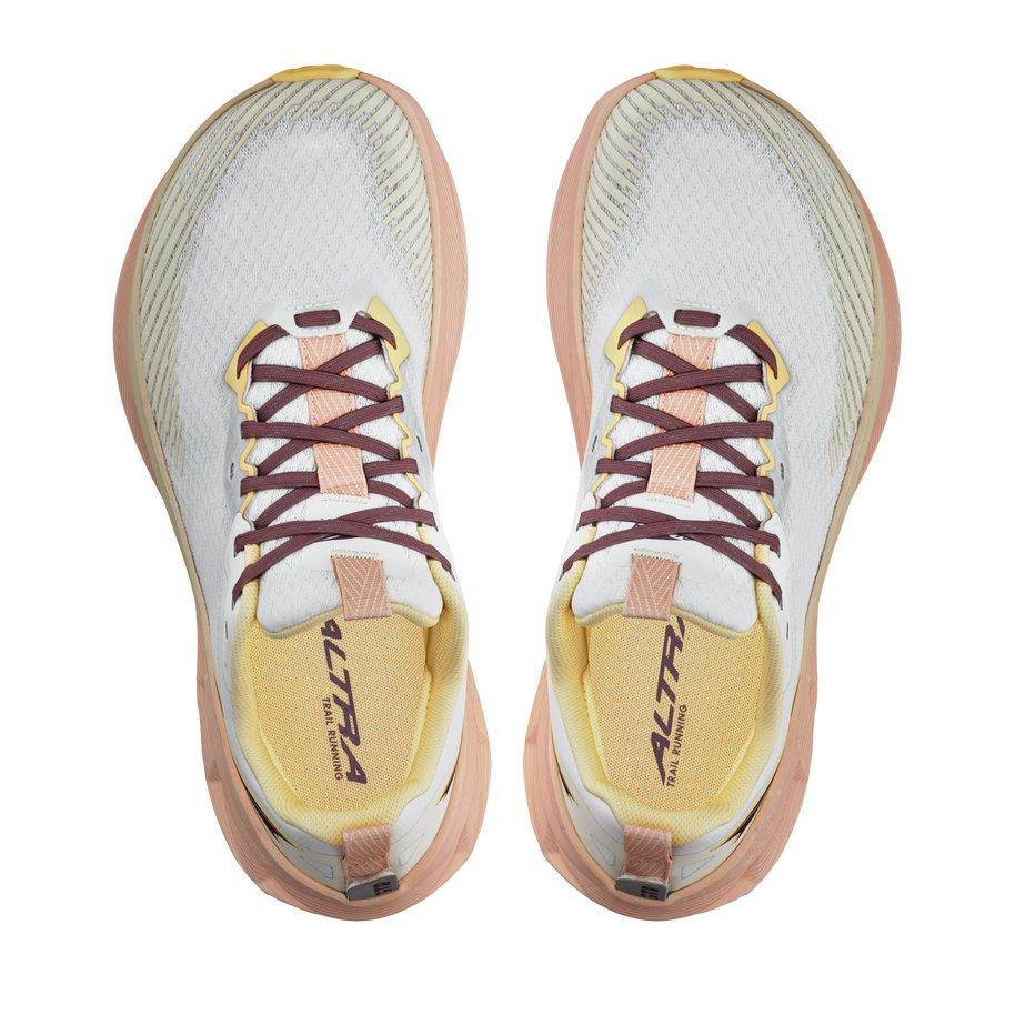 Experience Wild 2 - Women by Altra Footwear in white, pink, and yellow lightweight trail running shoe with grippy sole and breathable mesh upper
