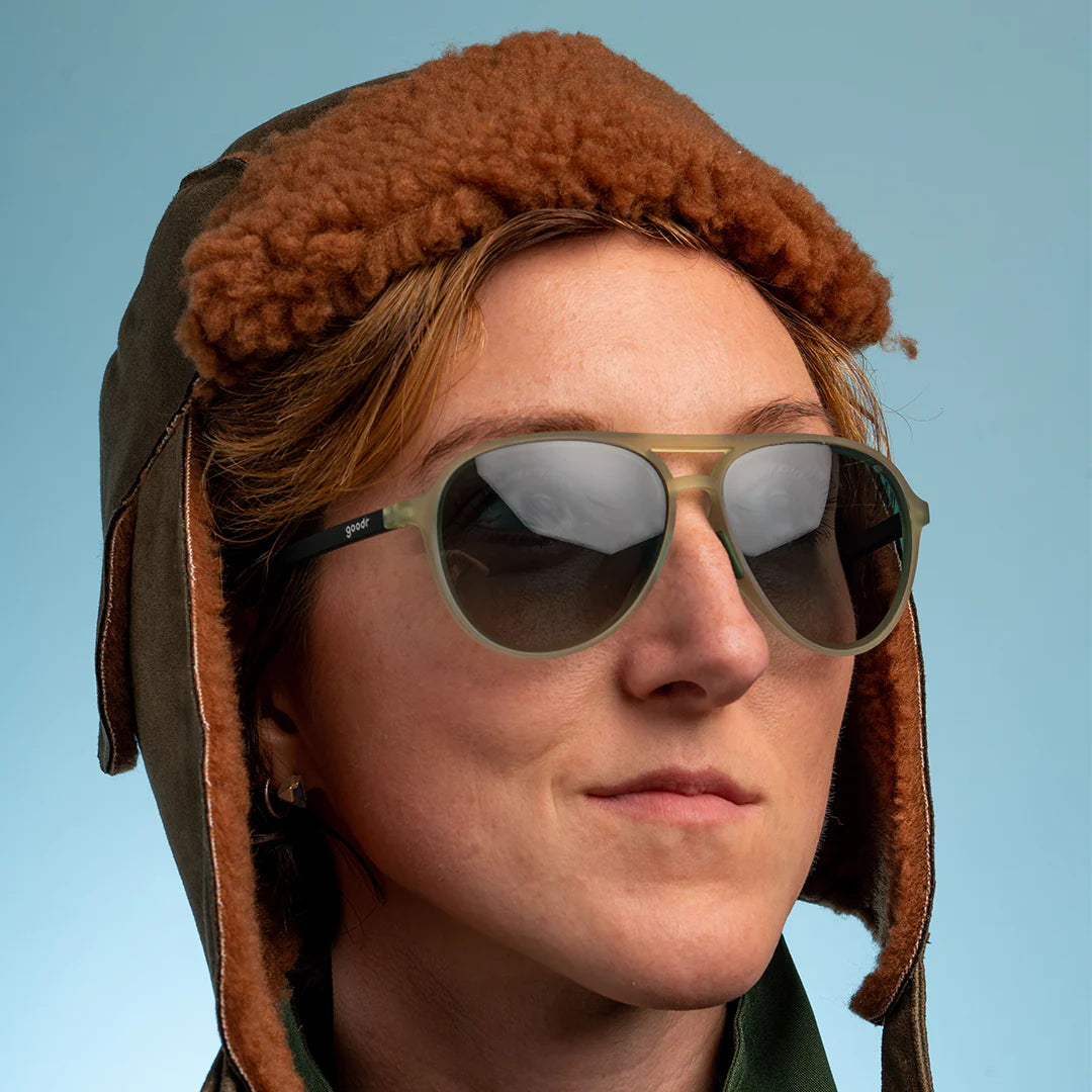 Buzzed On The Tower by Goodr in cadet green aviator sunglasses with polarized non-reflective lenses, no slip or bounce, ideal for outdoor use