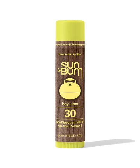 Lipbalm SPF 30 by Sun Bum in brown and yellow, moisturizing with Aloe and Vitamin E, broad spectrum protection for lips outdoors