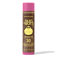 Lipbalm SPF 30 by Sun Bum in pink and brown, pomegranate flavor with Aloe and Vitamin E, moisturizing sun protection for lips