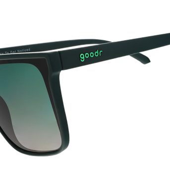 Tends To Get Noticed sunglasses by Goodr in deep green with oversized flat-top frame and green gradient lenses for bold outdoor style