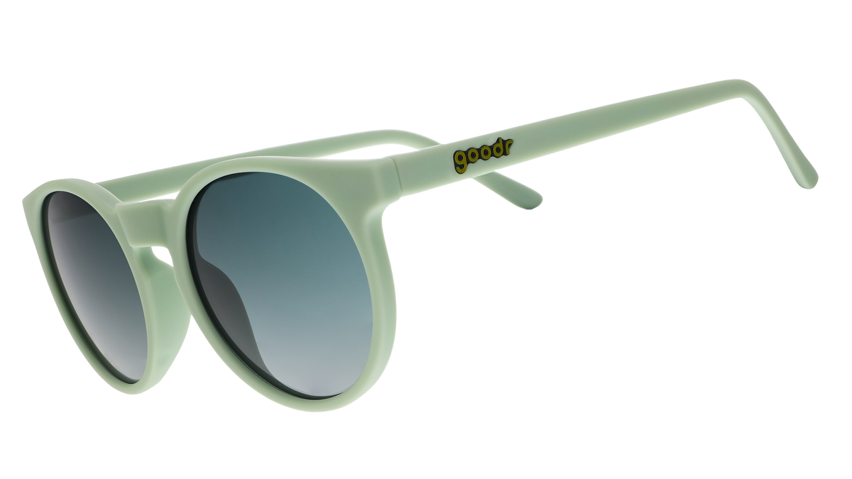 Goodr Incognito Plant Parent sunglasses, side view of round sage green frames with dark gradient lenses