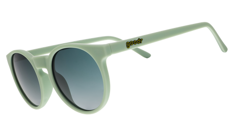 Goodr Incognito Plant Parent sunglasses, side view of round sage green frames with dark gradient lenses