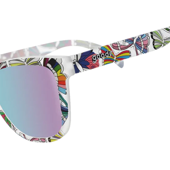 Is It Queer In Here Or Is It Just Us?! by Goodr in clear frames with vibrant LGBTQ+ butterfly patterns and purple lenses designed for Pride and outdoor use