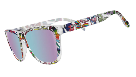 Is It Queer In Here Or Is It Just Us?! by Goodr in clear frames with vibrant LGBTQ+ butterfly patterns and purple lenses designed for Pride and outdoor use