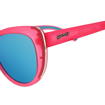 Flamingo Couture by Goodr translucent pink cat-eye sunglasses with teal reflective lenses and chrome accents for stylish outdoor wear