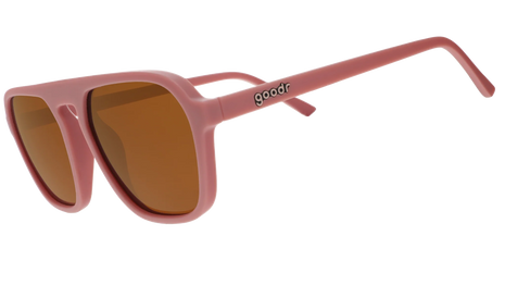 Threaten Me With a Good Time by Goodr in light pink vintage square aviator frames with brown non-reflective lenses for roller skating use