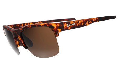 Country Club Crasher by Goodr brown tortoiseshell half-rim sunglasses with dual-lens wrap frame and adjustable nose piece for stylish disruption