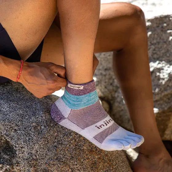 Trail Midweight Mini-Crew - Unisex by Injinji in purple and teal cushioned toesock for trail running and hiking on uneven terrain