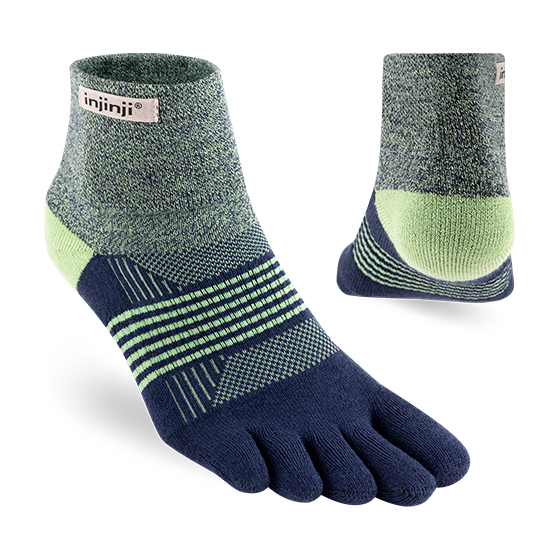Trail Midweight Mini-Crew - Women by Injinji in navy and green cushioned toesocks for running and hiking on uneven trails with agility and support