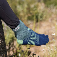 Trail Midweight Mini-Crew - Women by Injinji in blue and green cushioned toesocks for running and hiking on uneven trails with agile support