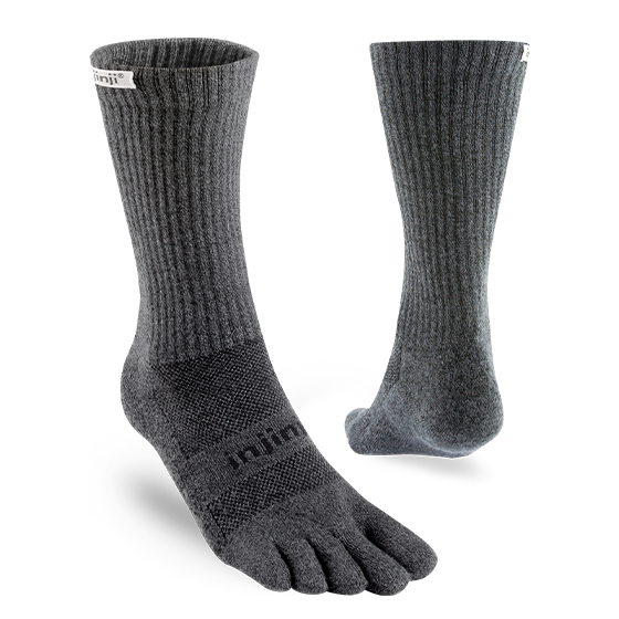 Trail Midweight Crew - Unisex by Injinji in dark grey toesocks, designed for blister prevention and rugged trail running and hiking.