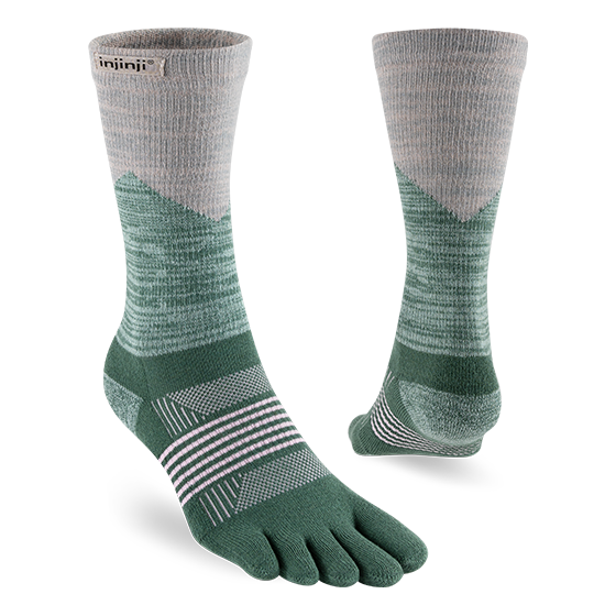 Trail Midweight Crew - Women by Injinji in green and gray with toe-wrap design for reduced friction, ideal for fast movement on rugged terrain