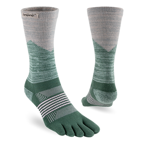 Trail Midweight Crew - Women by Injinji in green and gray with toe-wrap design for reduced friction, ideal for fast movement on rugged terrain
