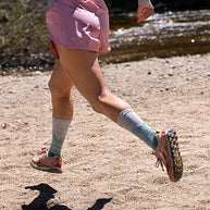 Trail Midweight Crew - Women by Injinji in blue and white toe socks designed for fast movement and reducing friction on rugged terrain