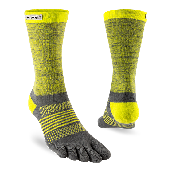 Trail Midweight Crew - Women by injinji in yellow and grey with toe fabric to reduce friction, designed for fast movement on rugged terrain