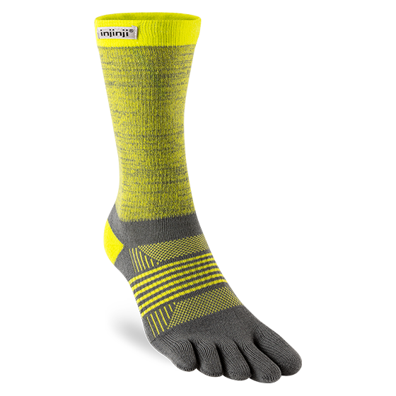 Trail Midweight Crew - Women by Injinji in grey and yellow with toe fabric to minimize friction, designed for fast movement on rugged terrain