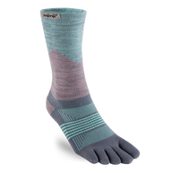 Trail Midweight Crew - Women by Injinji in teal and mauve with toe wrap design to reduce friction, ideal for fast movement on rugged terrain