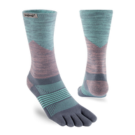 Trail Midweight Crew - Women by Injinji in blue and pink with five-toe design to reduce friction, ideal for fast movement on rugged terrain