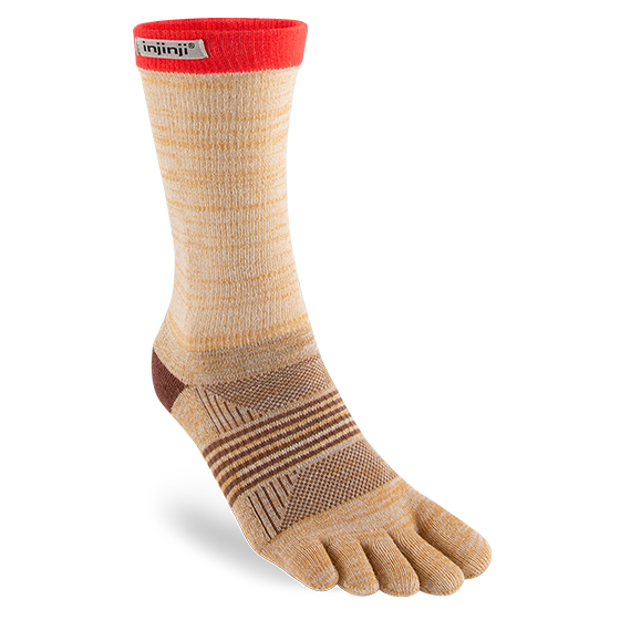 Trail Midweight Crew - Women by Injinji in beige and red toe socks designed to minimize friction and support fast movement on rugged terrain