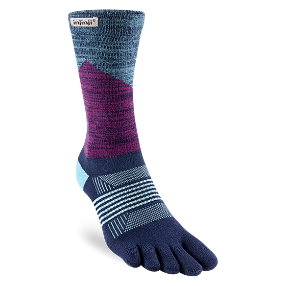 Trail Midweight Crew - Women by Injinji in blue and purple with toe fabric to reduce friction, designed for fast movement on rugged terrain