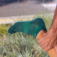 Injinji Run Lightweight No-Show - Unisex green five-toe running sock with low bulk designed to prevent blisters for all surfaces and runs