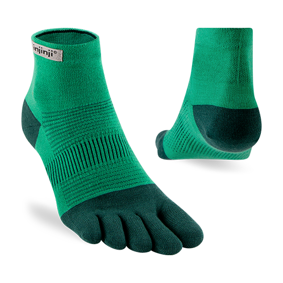 Run Lightweight Mini-Crew - Unisex by Injinji in green and dark teal, breathable socks designed to reduce friction and prevent blisters for running.