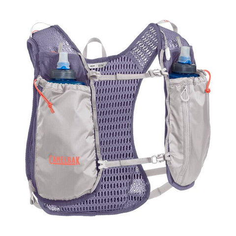 CamelBak Trail Run Vest 5.5L - Women in grey and purple, lightweight mesh, hydration vest for trail running and mountain adventures.