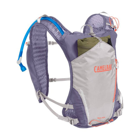 CamelBak Trail Run Vest 5.5L - Women in grey and purple with hydration pack, ideal for trail running and mountain peak adventures.