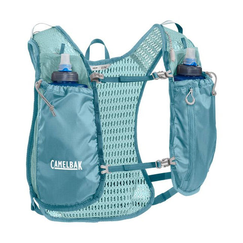 CamelBak Trail Run Vest 5.5L - Women in teal with hydration, breathable mesh, lightweight for trail running and mountain peak adventures