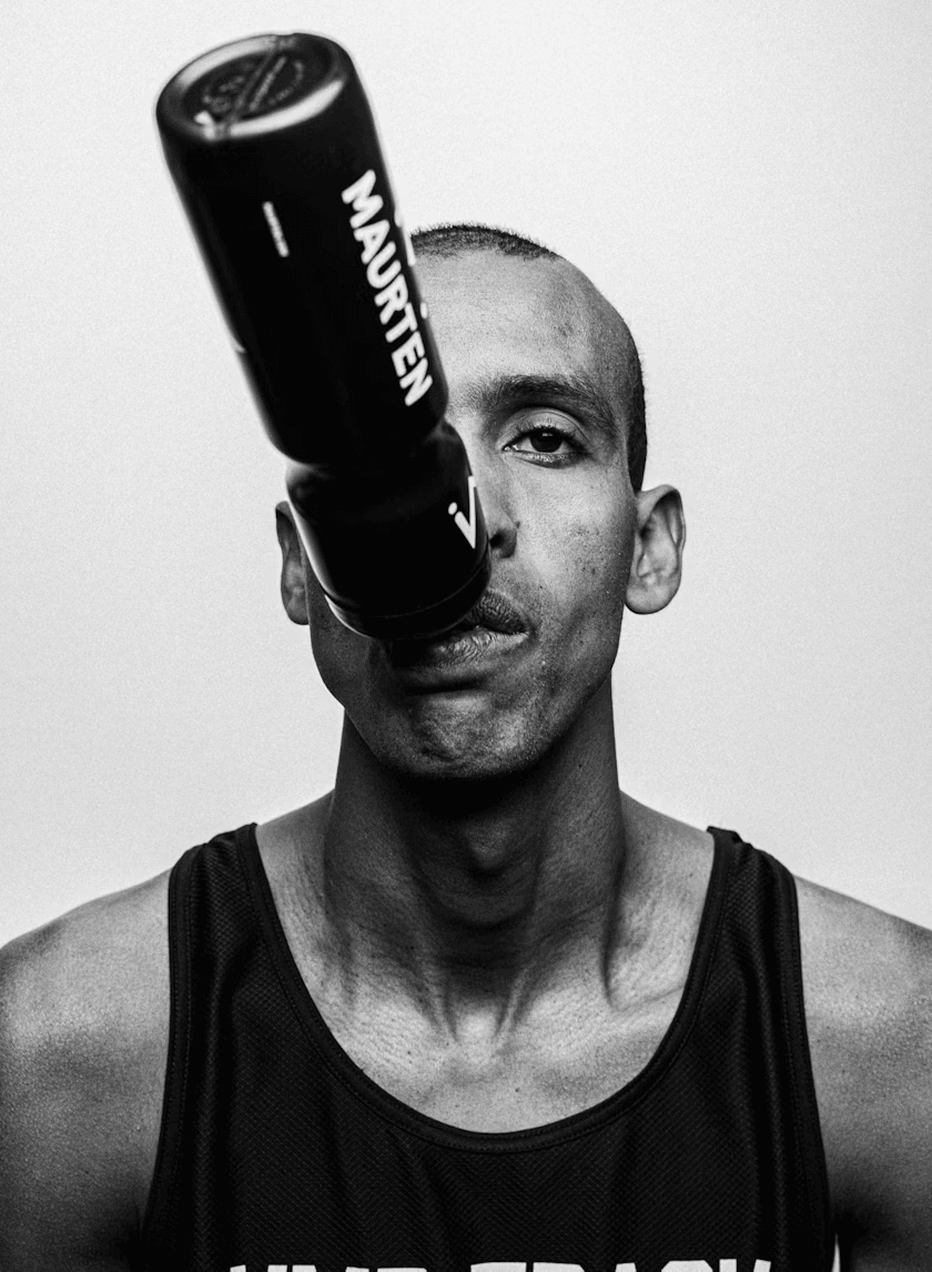 Drink Mix 160 by Maurten in black bottle with white logo, energy drink mix for hydration and carbs before during after running