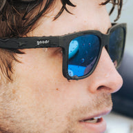 Buoys Don't Cry by Goodr in black with blue reflective water-repellent lenses, floating sunglasses for wave chasers and beach use