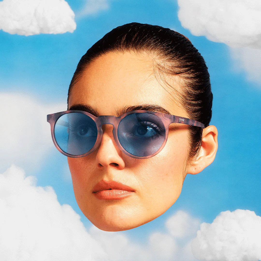 Embracing My Inner Meteorologist by Goodr in stormy pink-gray with blue lenses, stylish sunglasses ideal for weather enthusiasts and casual wear