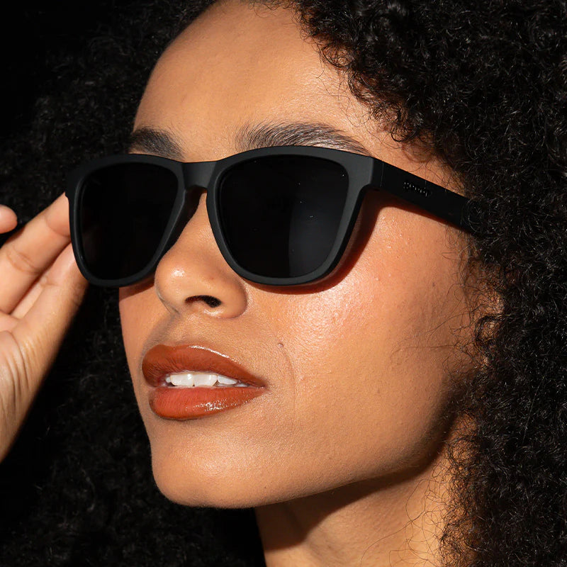 A Unicorn's Calamity black-on-black sunglasses by Goodr, lightweight glasses with unicorn magic, perfect for stylish outdoor use.