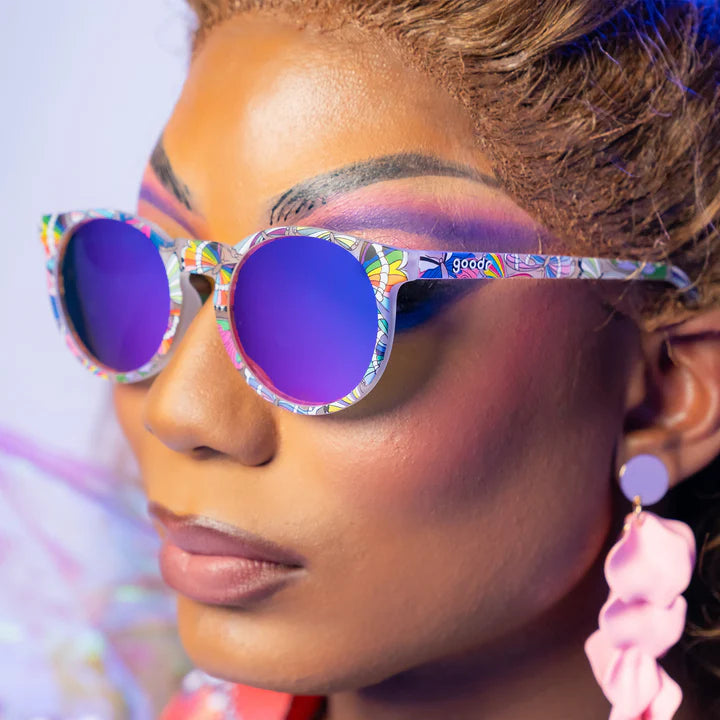 Not A Phase, A Transformation by Goodr, clear frames with purple lenses and butterfly LGBTQ+ flag design, stylish sunglasses for pride and outdoor wear