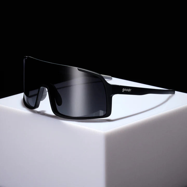 My Sweat Has an Octane Rating by Goodr in black with black gradient lenses, shield sunglasses for intense gym routines and running use