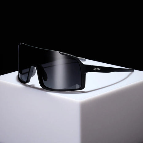 My Sweat Has an Octane Rating by Goodr in black with black gradient lenses, shield sunglasses for intense gym routines and running use