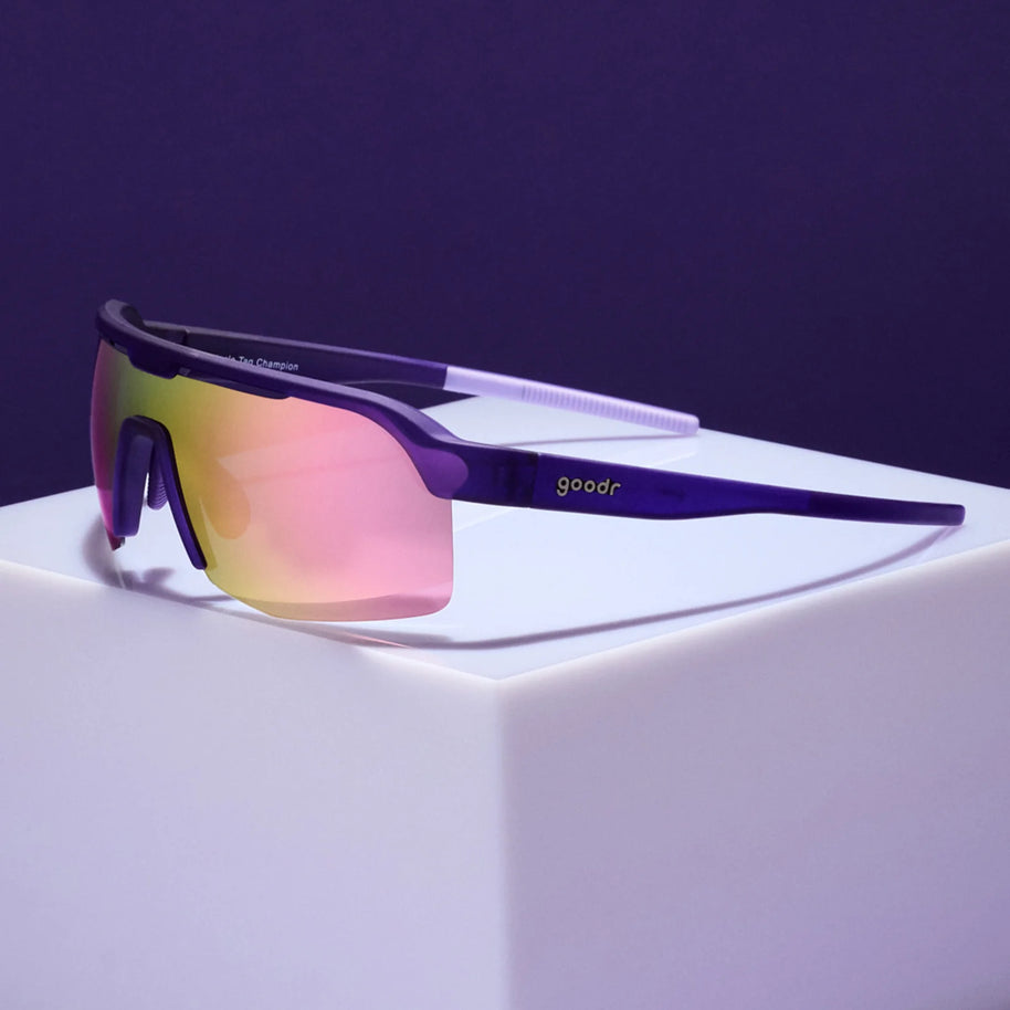 Tentacle Tag Champion by Goodr in purple with half-rim light pink reflective lenses, lightweight sunglasses for running and outdoor use