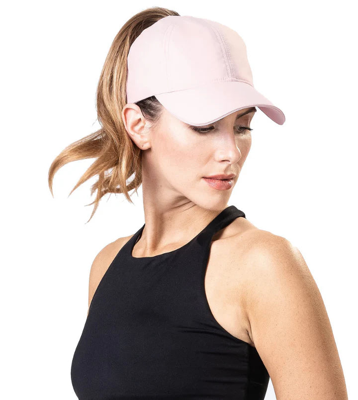 Performance 2.0 Ponytail Cap by Top Knot in pale pink, breathable headwear designed for women’s running and outdoor comfort